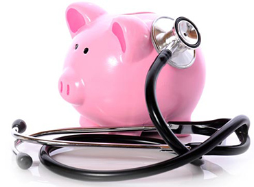 piggy bank and stethoscope health image